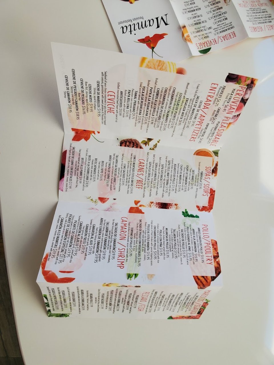 Restaurant menu showing Peruvian specialties and sweets.